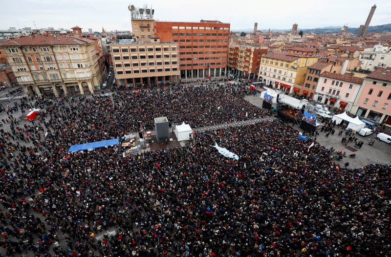 FILE PHOTO: Protesters attend a demonstration held by "the sardines", a grassroots movement against far-right League leader Matteo Salvini, in Bologna