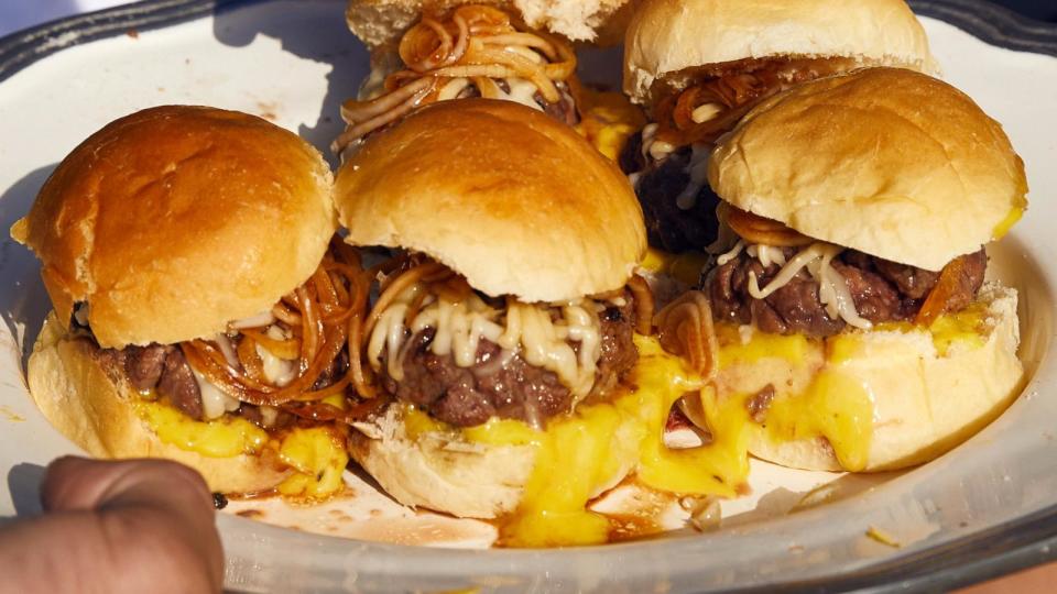 PHOTO: A plate of beef sliders with provolone and balsamic onions. (Michael Graydon + Nikole Herriott)