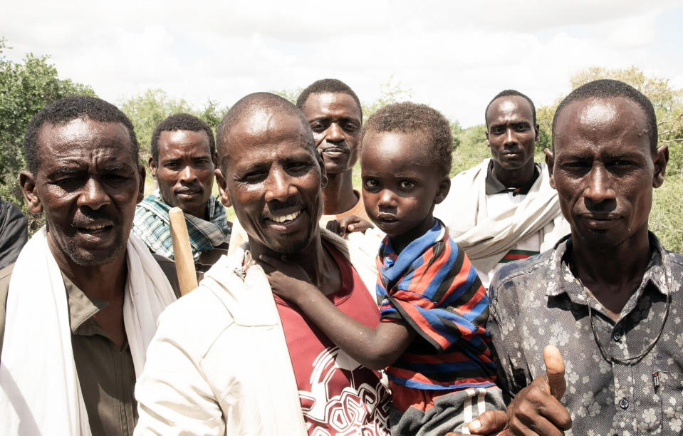 The search team walked the boy home to the village  while singing songs of thanks and blessings, the pilot said. (Sheldrick Wildlife Trust)