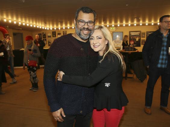 Jordan Peel and Lorena Gallo hug at the premiere of the film ‘Lorena’ during the 2019 Sundance Film Festival (Danny Moloshok/Invision/AP)