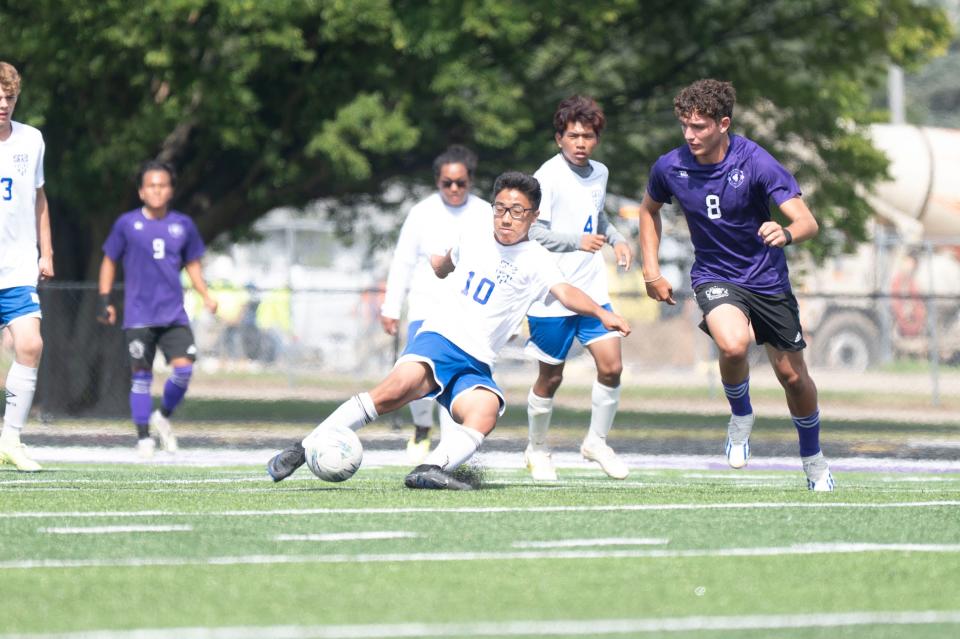 Battle Creek Academy senior Khup Kim competes against Lakeview in action earlier this season. BCA made history this week by earning a state ranking for the first time in school history.