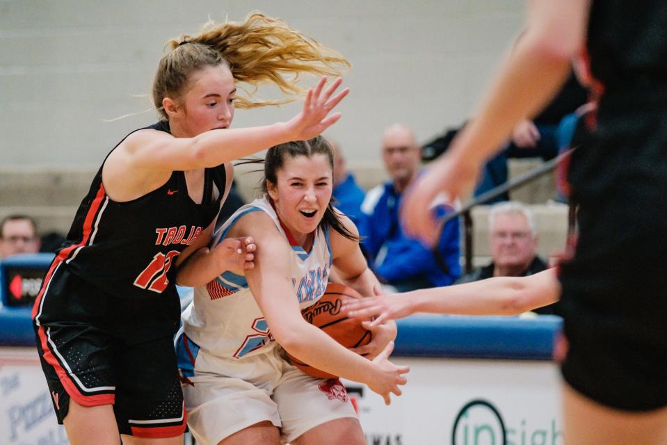 Garaway's Rylee Putt drives around the defense of TV's Leah Bourquin during their game Wednesday, Dec. 1, 2021 in Sugarcreek.