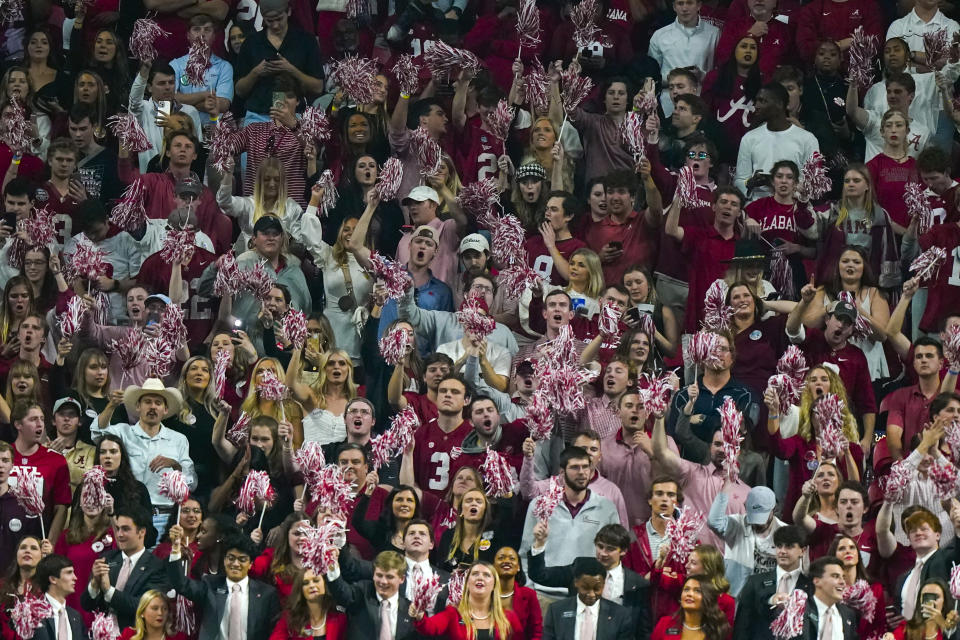 Alabama fans cheer during the second half of the Southeastern Conference championship NCAA college football game against Georgia, Saturday, Dec. 4, 2021, in Atlanta. (AP Photo/Brynn Anderson)