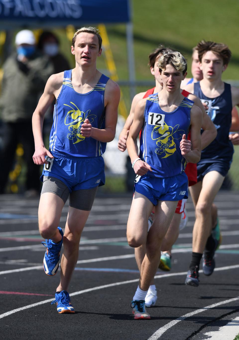 Gabe Shilling,left, and Brylan Holland of East Canton lead the pack in the 1600 at the Fairless Invitational . 