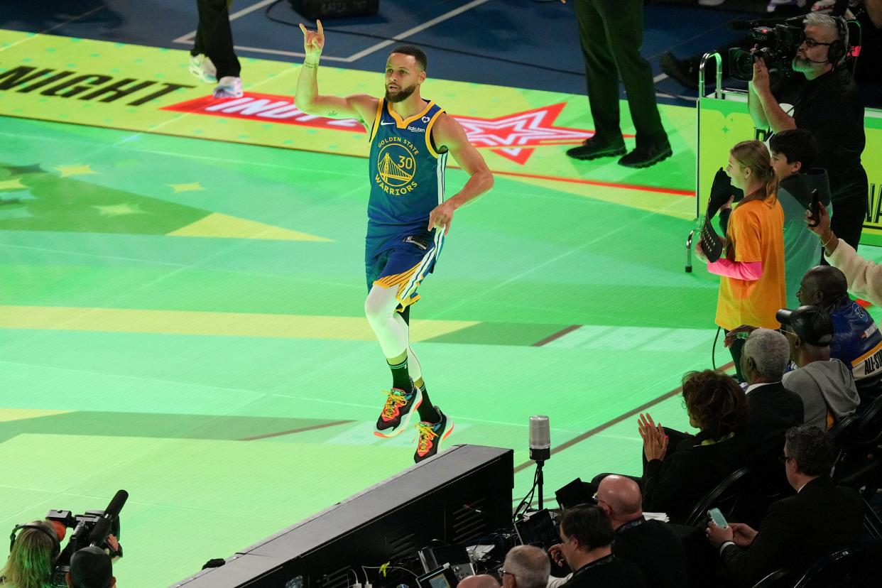 Golden State Warriors guard Stephen Curry (30) celebrates after winning the Stephen vs Sebrina three-point challenge Saturday, Feb. 17, 2024, during NBA All-Star Saturday Night at Lucas Oil Stadium in downtown Indianapolis.