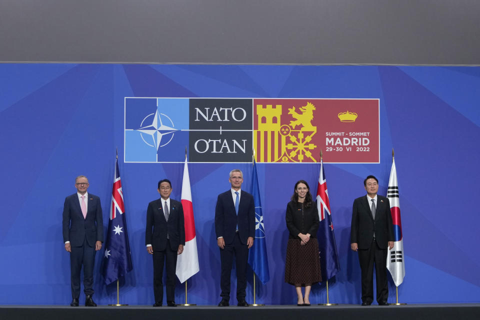 Australia's Prime Minister Anthony Albanese, Japan's Prime Minister Fumio Kishida, NATO Secretary General Jens Stoltenberg, New Zealand's Prime Minister Jacinda Ardern and South Korea's President Yoon Suk Yeol, from left, pose for media in a group photo of Indo-Pacific partners nations during the NATO summit in Madrid, Spain, on Wednesday, June 29, 2022. North Atlantic Treaty Organization heads of state will meet for a NATO summit in Madrid from Tuesday through Thursday. (AP Photo/Manu Fernandez)