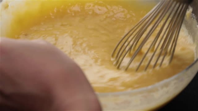 Whisking durian custard batter