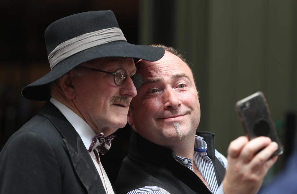 <p>A man takes a selfie with James Joyce impersonator Dermod Lynskey celebrating Bloomsday in Duke Street Dublin. Picture date: Wednesday June 16, 2021. Bloomsday is a celebration of the life of Irish writer James Joyce, observed annually worldwide on June 16, the day his 1922 novel Ulysses takes place in 1904, the date of his first outing with his wife-to-be Nora Barnacle. The day is named after its protagonist Leopold Bloom. Picture date: Wednesday June 16, 2021.</p>
