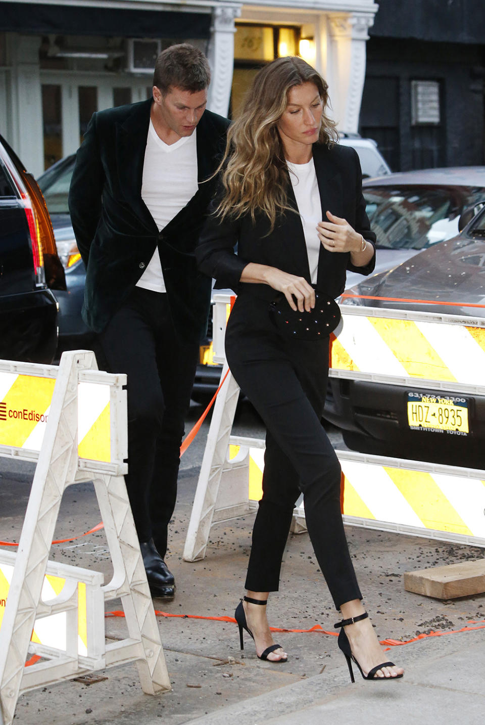 <p>Stylish pair Tom Brady and Gisele Bündchen stepped out the night before the 2017 Met Gala in matching suits. (Photo: TheImageDirect.com) </p>