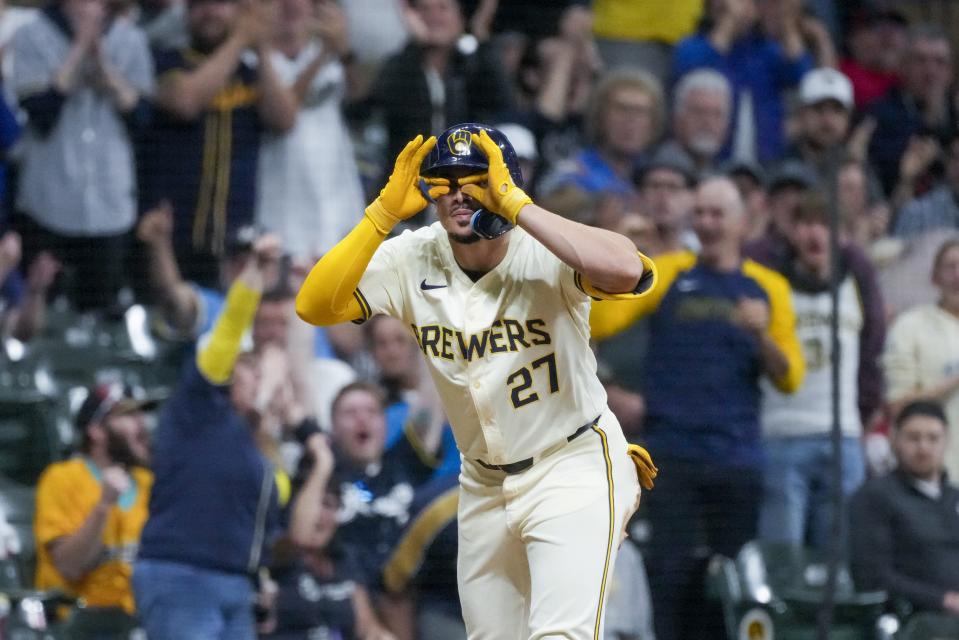 Milwaukee Brewers' Willy Adames reacts after hitting a two-run scoring hit during the fifth inning of a baseball game against the St. Louis Cardinals Friday, May 10, 2024, in Milwaukee. (AP Photo/Morry Gash)