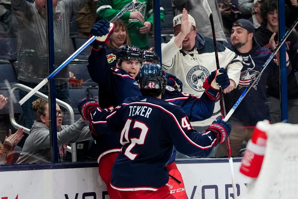 Oct 24, 2023; Columbus, Ohio, USA; Teammates celebrate a goal by Columbus Blue Jackets center Adam Fantilli (11) during the third period of the NHL game against the Anaheim Ducks at Nationwide Arena. The Blue Jackets lost 3-2 (OT).