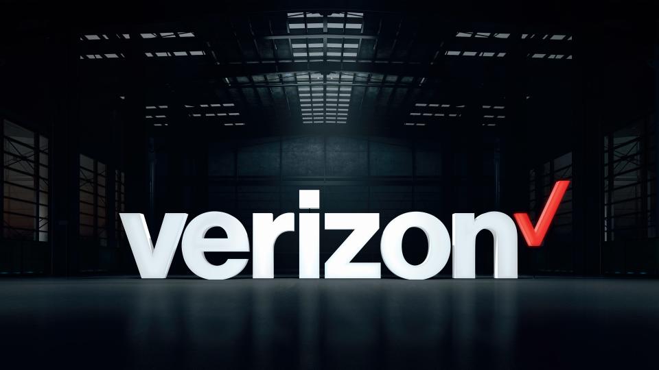 Verizon logo in warehouse setting.