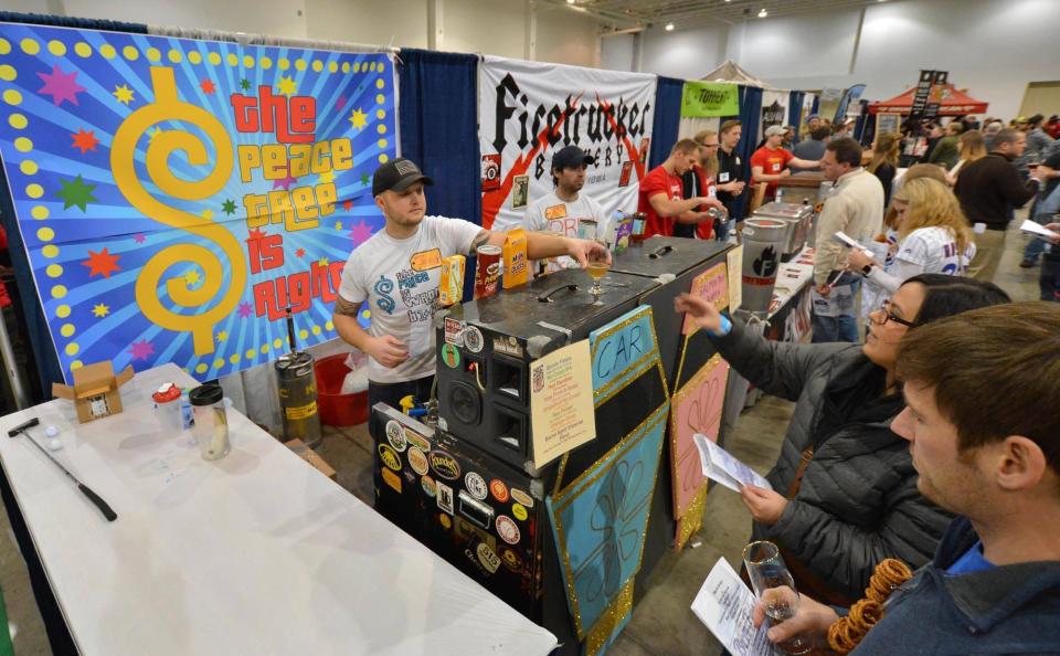 Breweries give out 2.0 oz tasters to BrrrFest attendees at a previous BrrrFest.