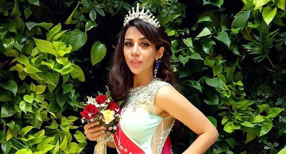 Pictured is Bahareh Zare Bahari in with a sash and crown on at the Miss Intercontinental 2018 pageant in Manila.