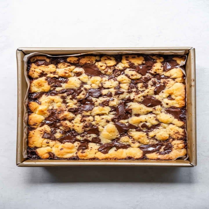 Orange chocolate shortbread in a baking dish.