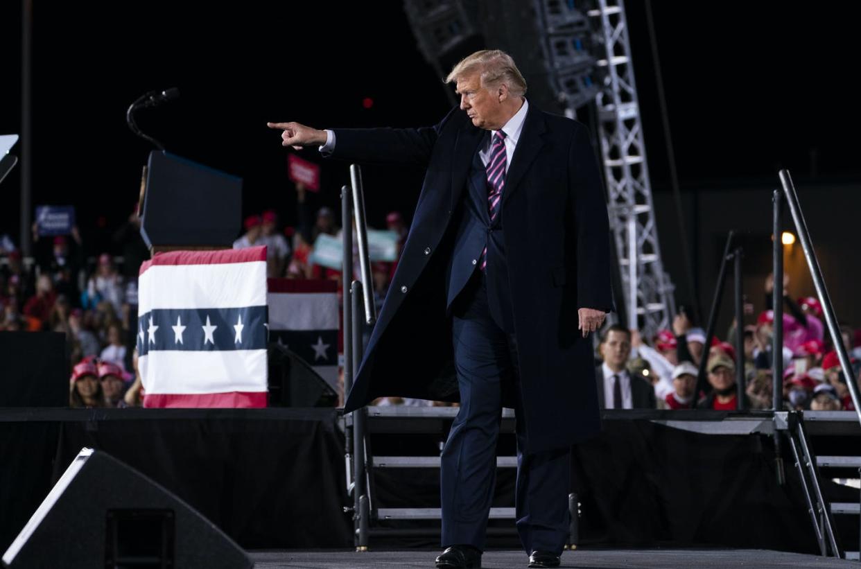 <span class="caption">Trump campaigning for votes in Pittsburgh in late September 2020.</span> <span class="attribution"><a class="link " href="https://newsroom.ap.org/detail/Election2020Trump/1cc484497acf448697d0678ae94de255/photo?Query=Trump%20AND%20campaigning&mediaType=photo&sortBy=arrivaldatetime:desc&dateRange=Anytime&totalCount=23881&currentItemNo=19" rel="nofollow noopener" target="_blank" data-ylk="slk:Evan Vucci/AP;elm:context_link;itc:0;sec:content-canvas">Evan Vucci/AP</a></span>