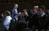 Cisco CEO John Chambers walks among the crowd while delivering his keynote speech at the annual Consumer Electronics Show (CES) in Las Vegas, Nevada January 7, 2014. REUTERS/Robert Galbraith (UNITED STATES - Tags: BUSINESS SCIENCE TECHNOLOGY)