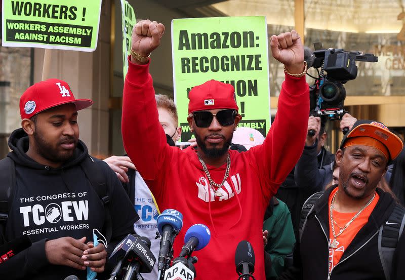 FILE PHOTO: Amazon.com Inc workers react to the outcome of the vote to unionize, in Brooklyn