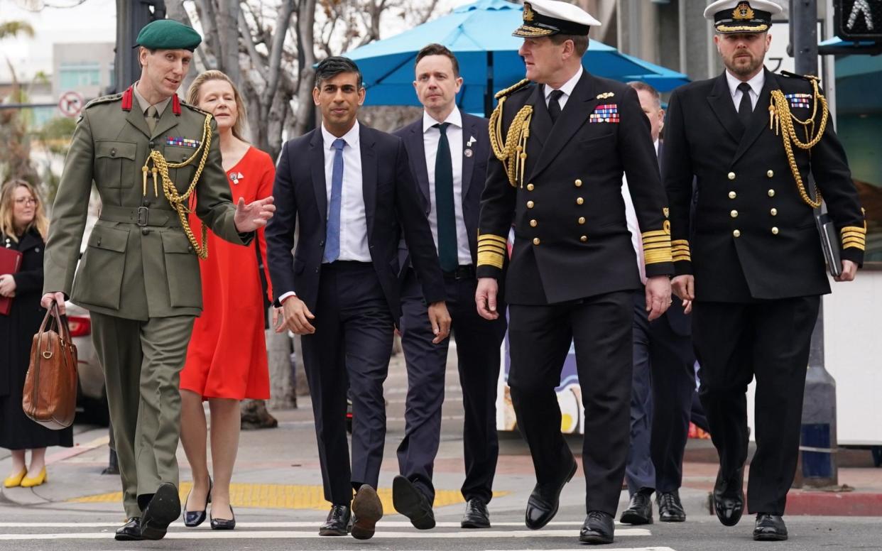 Rishi Sunak with (left to right) Col Jaimie Norman, Admiral Sir Ben Key, and Commander Gus Carnie during his visit to San Diego for Aukus talks - PA