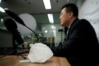 A mask is seen as a professor of Pusan National University Park Hyun who used to be a coronavirus patient, gives an online lecture at Pusan National University in Busan