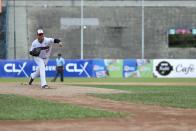 Pitcher from Tiburones de La Guaira team, practices before a game at University Stadium in Caracas