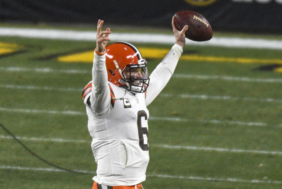 Cleveland Browns quarterback Baker Mayfield (6) celebrates as he walks off the field following a win over the Pittsburgh Steelers in an NFL wild-card playoff football game in Pittsburgh, Sunday, Jan. 10, 2021. (AP Photo/Don Wright)