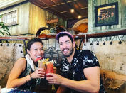 <p><em>Property Brothers</em> star <a rel="nofollow noopener" href="http://people.com/home/property-brothers-drew-scott-engaged-to-linda-phan/" target="_blank" data-ylk="slk:Drew Scott;elm:context_link;itc:0;sec:content-canvas" class="link ">Drew Scott</a> and new fiancé <a rel="nofollow noopener" href="http://people.com/home/property-brothers-drew-scott-fiance-linda-phan/" target="_blank" data-ylk="slk:Linda Phan;elm:context_link;itc:0;sec:content-canvas" class="link ">Linda Phan</a> enjoyed some tropical beverages during a <a rel="nofollow noopener" href="http://people.com/home/property-brothers-christmas-vacation-girlfriends/" target="_blank" data-ylk="slk:trip to Hawaii;elm:context_link;itc:0;sec:content-canvas" class="link ">trip to Hawaii</a> that also included Drew's <a rel="nofollow noopener" href="http://people.com/home/property-brothers-drew-and-jonathan-scott-christmas-decorations-and-traditions/a-property-brothers-christmas/" target="_blank" data-ylk="slk:twin brother Jonathan;elm:context_link;itc:0;sec:content-canvas" class="link ">twin brother Jonathan</a>, his girlfriend, Jacinta, and extended family. </p>