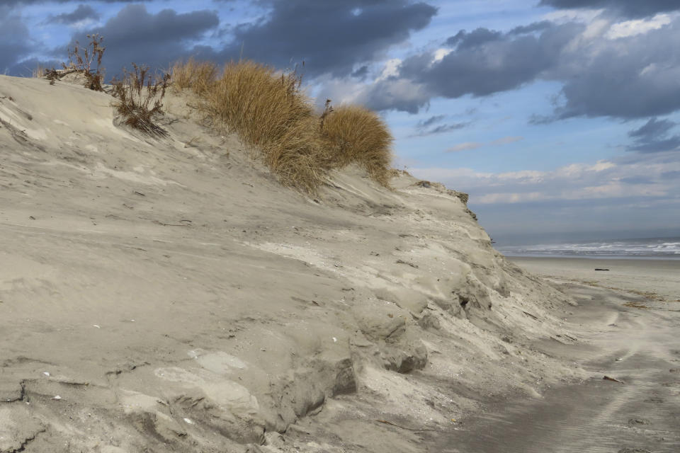 This Jan. 5, 2023 photo shows an eroded beach in North Wildwood, N.J. On Feb. 1, 2023, a judge denied the city permission to build a bulkhead to protect against erosion, but allowed it to move forward with a $21 million lawsuit seeking damages from the state to recoup the cost of sand the city trucked in at its own expense in the absence of a state and federal beach replenishment project. (AP Photo/Wayne Parry)