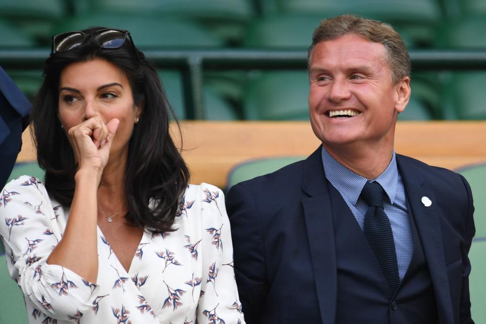 Karen Minier and David Coulthard, pictured here at Wimbledon in 2019.