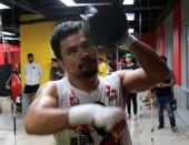 Senator and boxing champion Manny "Pacman" Pacquiao practices on a speed ball inside the Elorde gym in Pasay city, metro Manila, Philippines September 28, 2016 in preparation for his upcoming bout with Jessie Vargas next month in Las Vegas, U.S.A. Picture taken September 28, 2016. REUTERS/Romeo Ranoco