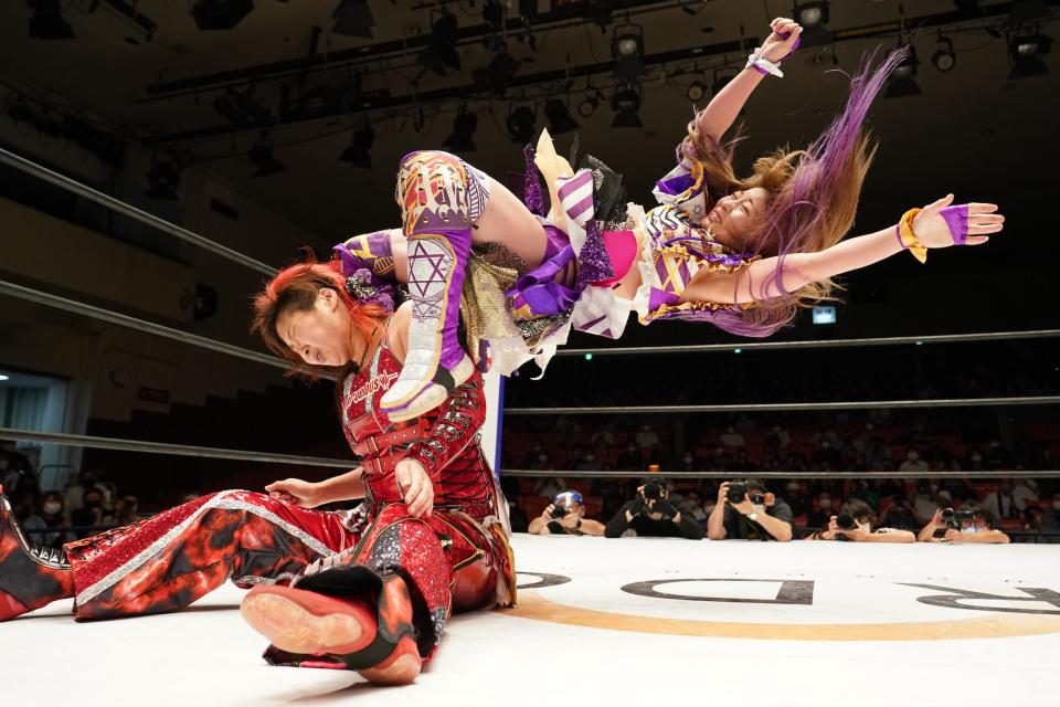 Tam Nakano and Takumi Iroha compete during the Pro-Wrestling "Stardom" at Korakuen Hall in Tokyo, Japan.