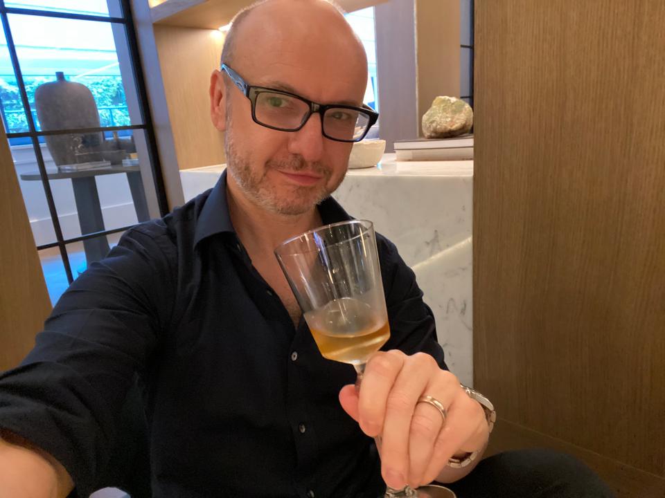 The author smiling with a glass, Paul Oswell, Capella Sydney Hotel review
