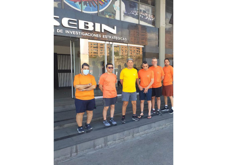 FILE - This undated photo posted to Twitter on June 18, 2020, by Venezuela's Foreign Minister Jorge Arreaza, shows Citgo oil executives, from left, Jose Angel Pereira, Gustavo Cardenas, Jorge Toledo, Jose Luis Zambrano, Tomeu Vadell and Alirio Jose Zambrano standing outside the Bolivarian National Intelligence Service in Caracas, Venezuela. Vadell, one of the six oil executives who was held for nearly five years in Venezuela before being released in 2022, sued his company Tuesday, March 21, 2023, for $100 million . (Posted on Twitter by Jorge Arreaza/Venezuela's Foreign Ministry via AP, File)