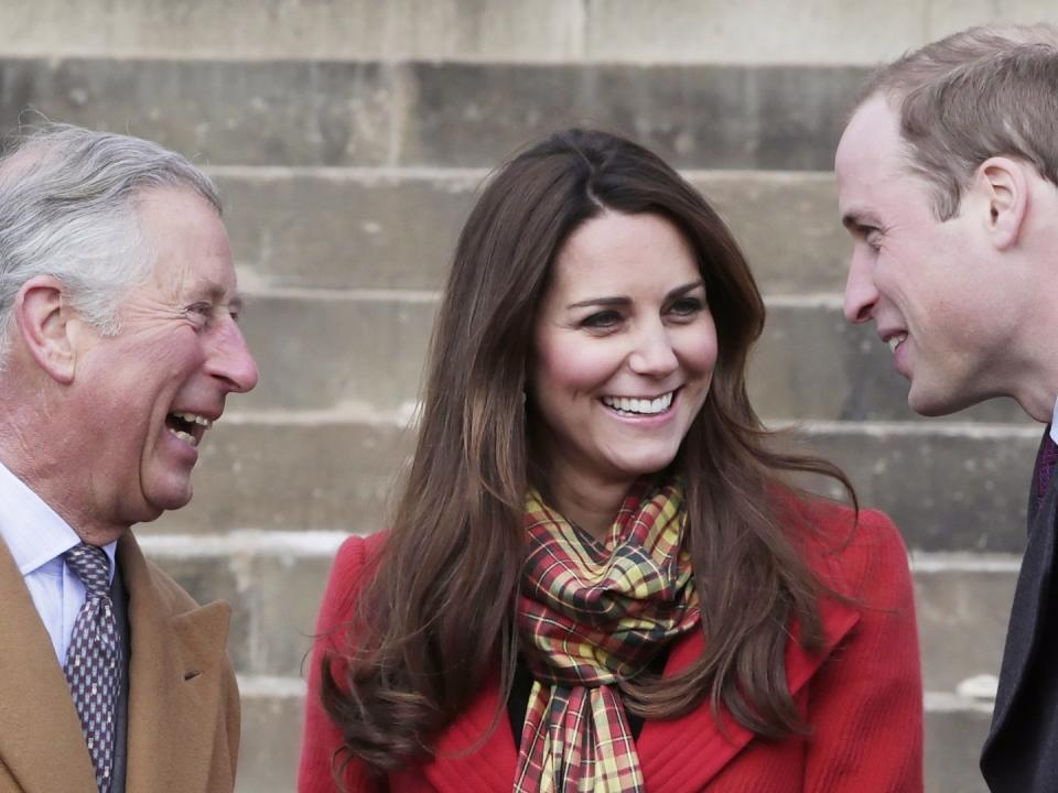 AYRSHIRE, UNITED KINGDOM- MARCH 05: Prince Charles, Duke of Rothesay, Catherine, Countess of Strathearn and Prince William, Earl of Strathearn share a joke during a visit to Dumfries House on March 05, 2013 in Ayrshire, Scotland. The Duke and Duchess of Cambridge braved the bitter cold to attend the opening of an outdoor centre in Scotland today. The couple joined the Prince of Wales at Dumfries House in Ayrshire where Charles has led a regeneration project since 2007. Hundreds of locals and 600 members of youth groups including the Girl Guides and Scouts turned out for the official opening of the Tamar Manoukin Outdoor Centre. (Photo by Danny Lawson - WPA Pool/Getty Images)