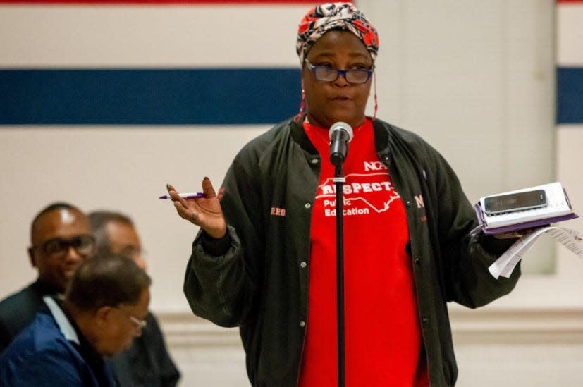 Carrol Olinger, grandparent of a student at T.C. Berrien speaks at a parents meeting for Cumberland County Schools on Nov. 19, 2019. The Fayetteville, N.C., school was closed and its student body was located to Spring Lake, N.C., which is 10 miles away, after mold and air-quality issues were discovered.