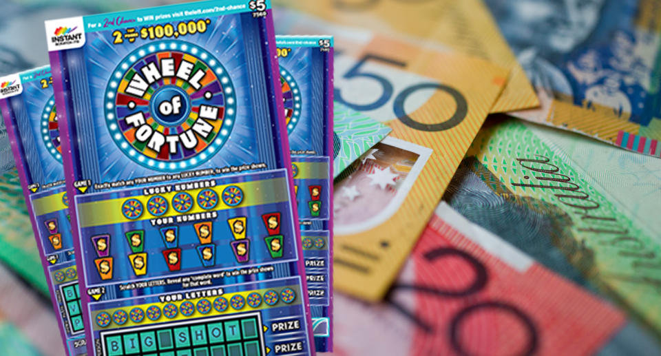 Wheel of Fortune scratch card on pile of Australian cash. 
