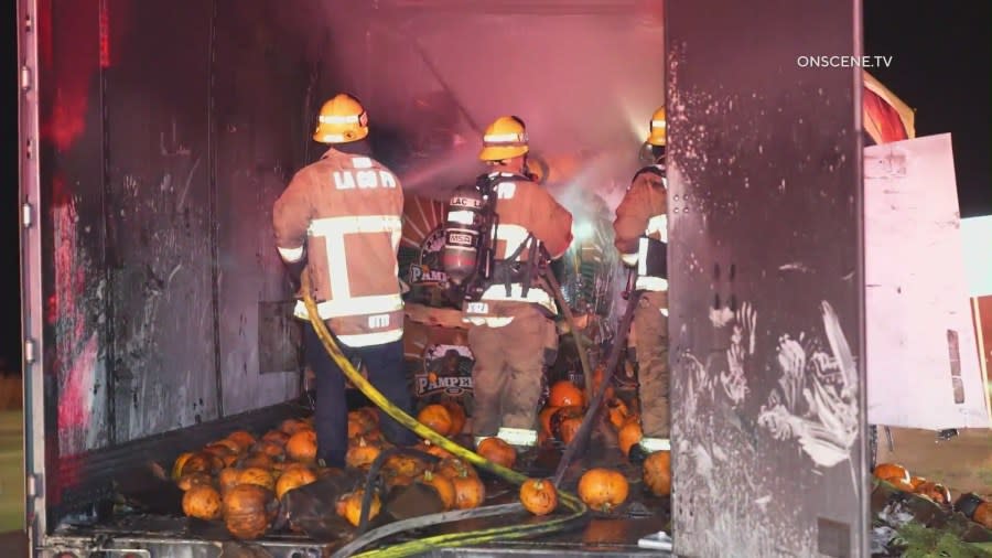 Semi-truck filled with pumpkins bursts into flames on 5 Freeway 