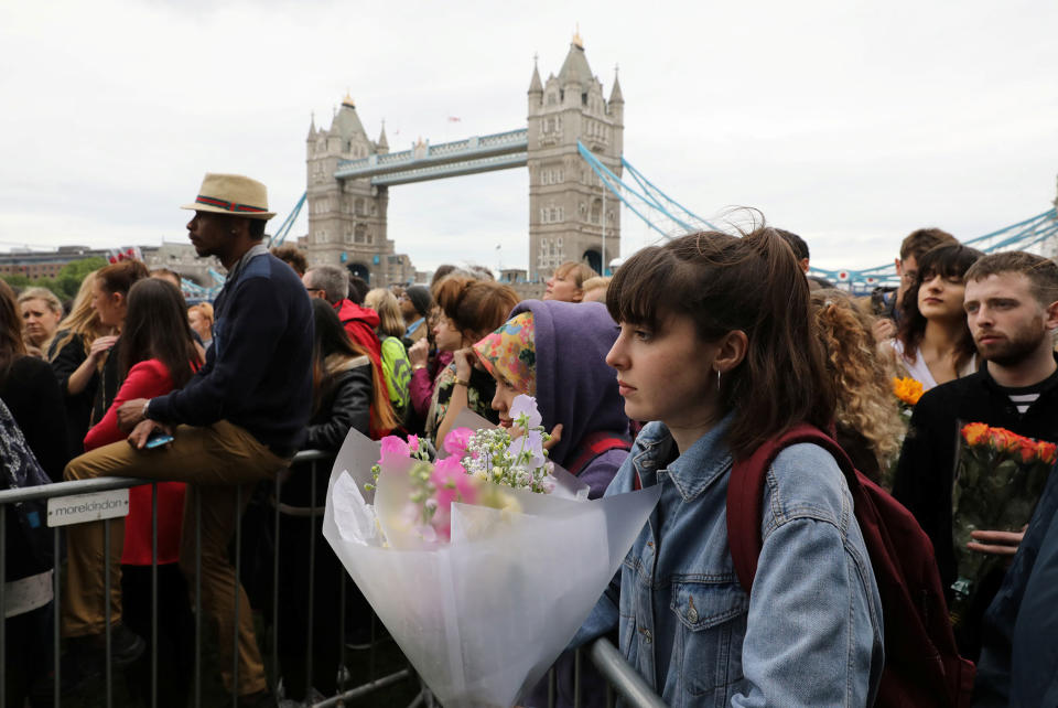 People attend a vigil to remember the victims