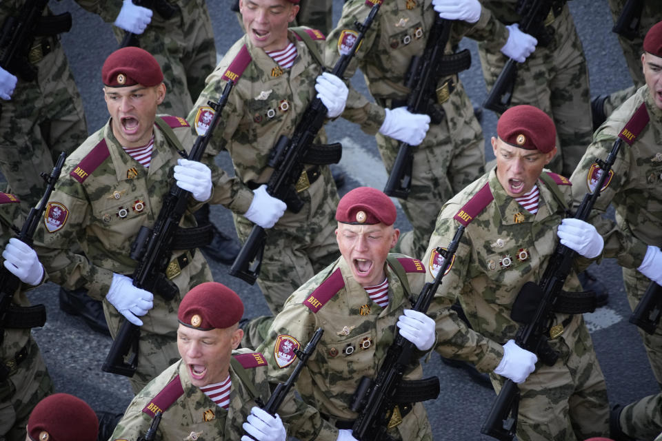 Russian soldiers march toward Red Square to attend a Victory Day military parade in Moscow, Russia, Tuesday, May 9, 2023, marking the 78th anniversary of the end of World War II. (AP Photo/Alexander Zemlianichenko)