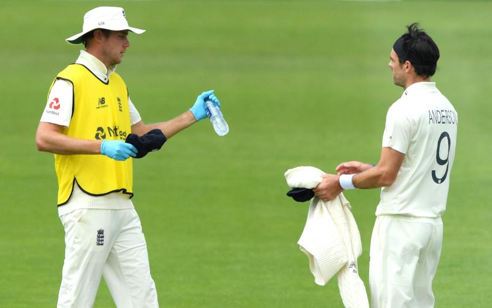 Stuart Broad has been reduced to water-carrying duties for his usual opening partner James Anderson - GETTY IMAGES