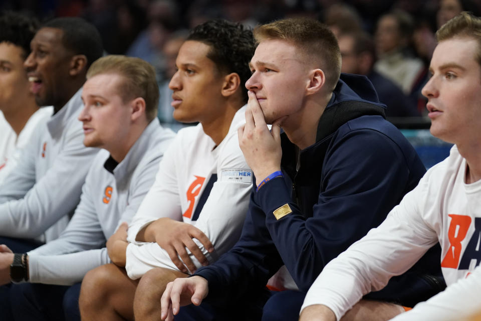 Syracuse's Buddy Boeheim sits on the bench in the first half of an NCAA college basketball game against Duke during quarterfinals of the Atlantic Coast Conference men's tournament, Thursday, March 10, 2022, in New York. (AP Photo/John Minchillo)