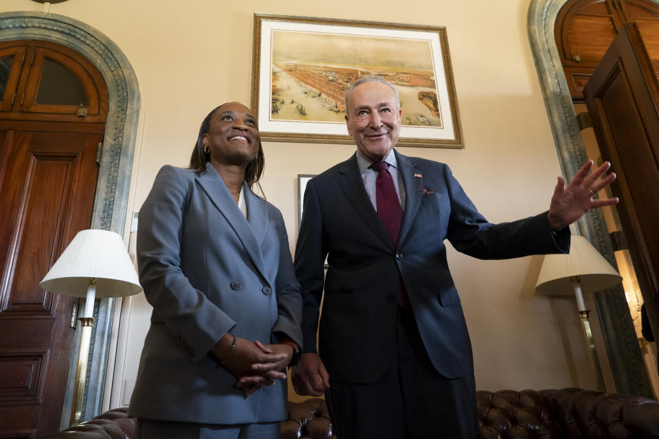 Senate Majority Leader Chuck Schumer, D-N.Y., meets with Laphonza Butler before she is sworn in to succeed the late Sen. Dianne Feinstein, D-Calif., Tuesday, Oct. 3, 2023, on Capitol Hill in Washington. (AP Photo/Stephanie Scarbrough)