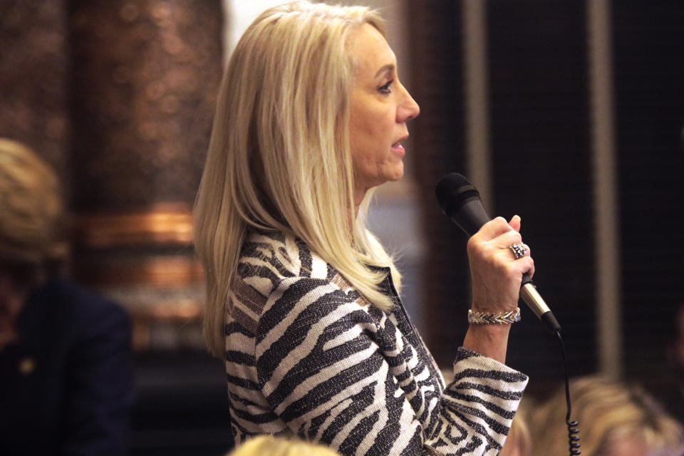 Kansas state Sen. Renee Erickson, R-Wichita, speaks in favor of a bill that would create a tax credit for donors to centers that discourage abortions while also providing free services and supplies for pregnant women and new parents, Thursday, Feb. 23, 2023, at the Statehouse in Topeka, Kan. Providing financial help to such centers is the main goal of abortion opponents after an August 2022 statewide vote in Kansas affirming abortion rights. (AP Photo/John Hanna)