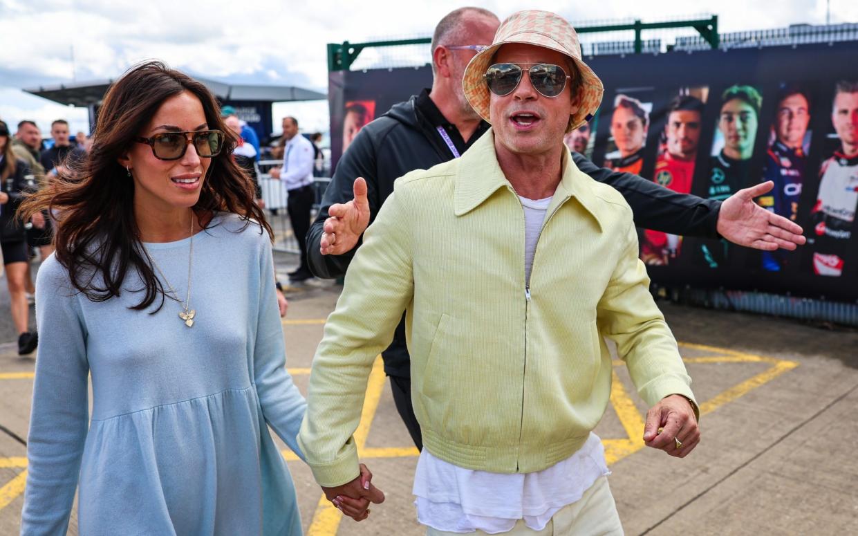 Brad Pitt in the paddock with girlfriend Ines de Ramon during the British Grand Prix at Silverstone in 2024