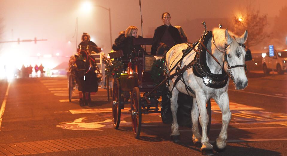 A Dickens of a Christmas is a Victorian holiday event that was held in downtown Spartanburg on Dec. 6. Many took the chance to take a ride in a horse drawn carriage around the downtown area. 