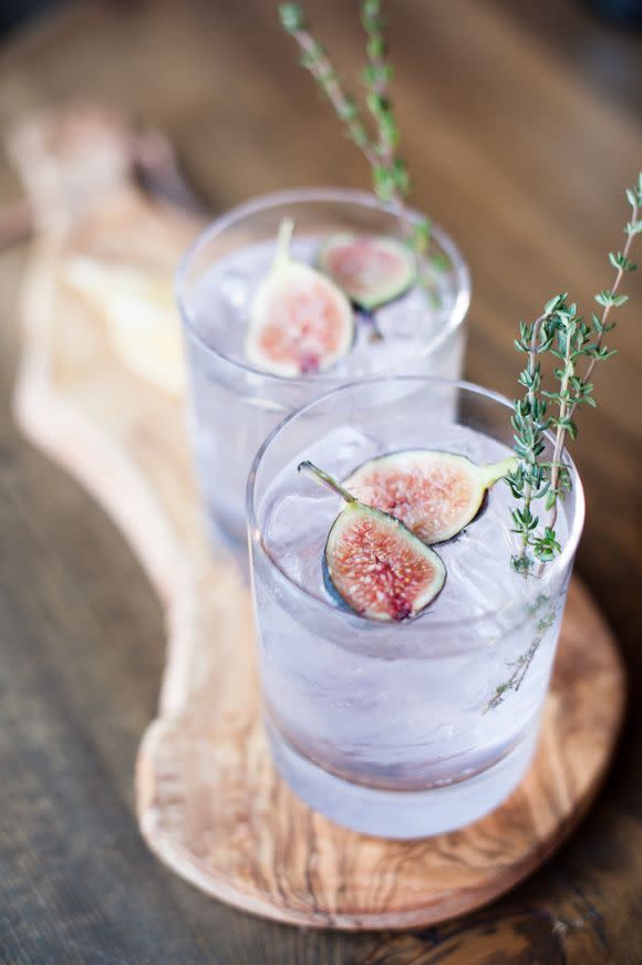 <p>A stick of lavender and freshly halved figs give this pale purple cocktail extra flair.</p><p><em><a href="http://www.magnoliarouge.com/inspiration/the-gathered-table-by-sarah-box-photography/" rel="nofollow noopener" target="_blank" data-ylk="slk:Get the recipe from Magnolia Rouge »;elm:context_link;itc:0;sec:content-canvas" class="link ">Get the recipe from Magnolia Rouge »</a></em></p>