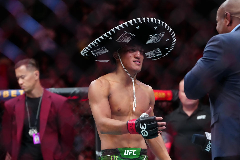 Sep 16, 2023; Las Vegas, Nevada, USA; Raul Rosas Jr. (red gloves) reacts after defeating Terrence Mitchell (not pictured) during UFC Fight Night at T-Mobile Arena. Mandatory Credit: Stephen R. Sylvanie-USA TODAY Sports