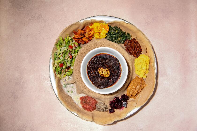 LOS ANGELES, CA - OCTOBER 23: Vegetarian combo with dorowot from Genet Agonafer, chef/owner of Meals By Genet on Saturday, Oct. 23, 2021 in Los Angeles, CA. (Mariah Tauger / Los Angeles Times)