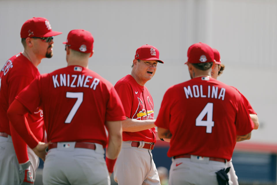 St. Louis Cardinals manager Mike Shildt talks with members of his team during spring training baseball practice Wednesday, Feb. 12, 2020, in Jupiter, Fla. (AP Photo/Jeff Roberson)