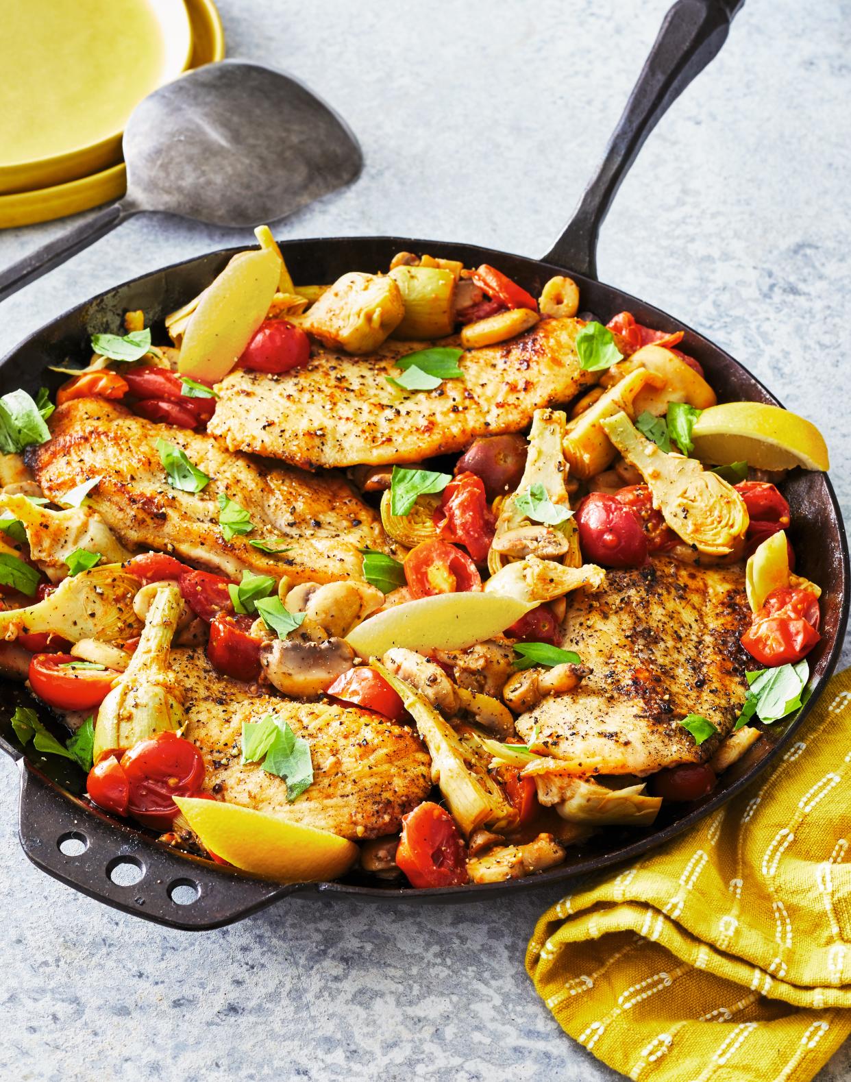 Tuesday night skillet chicken cutlets with artichokes and mushrooms. Med Dish 2022 Photography: Caitlin Bensel